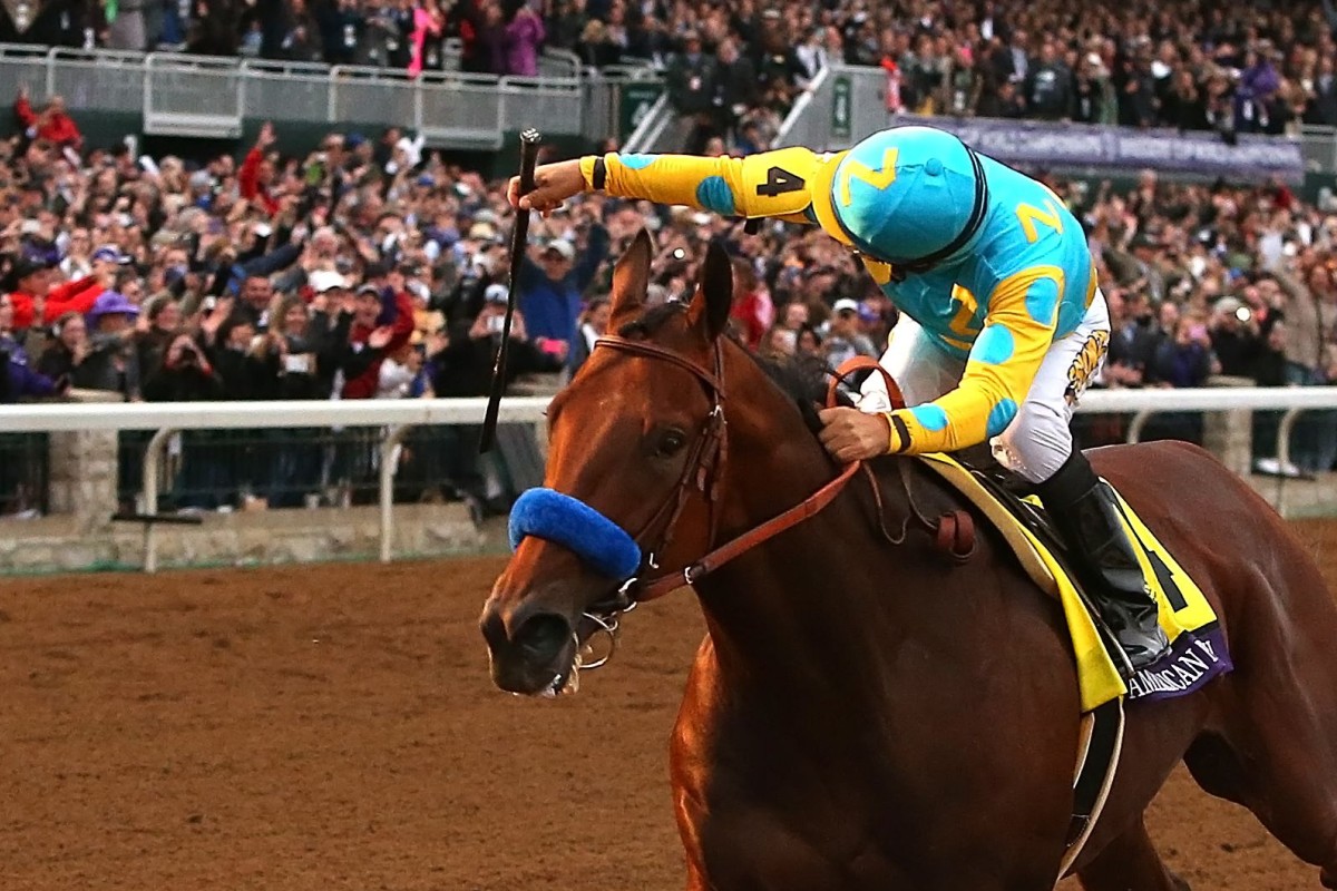 Victor Espinoza guides American Pharoah home. Photo: AFP