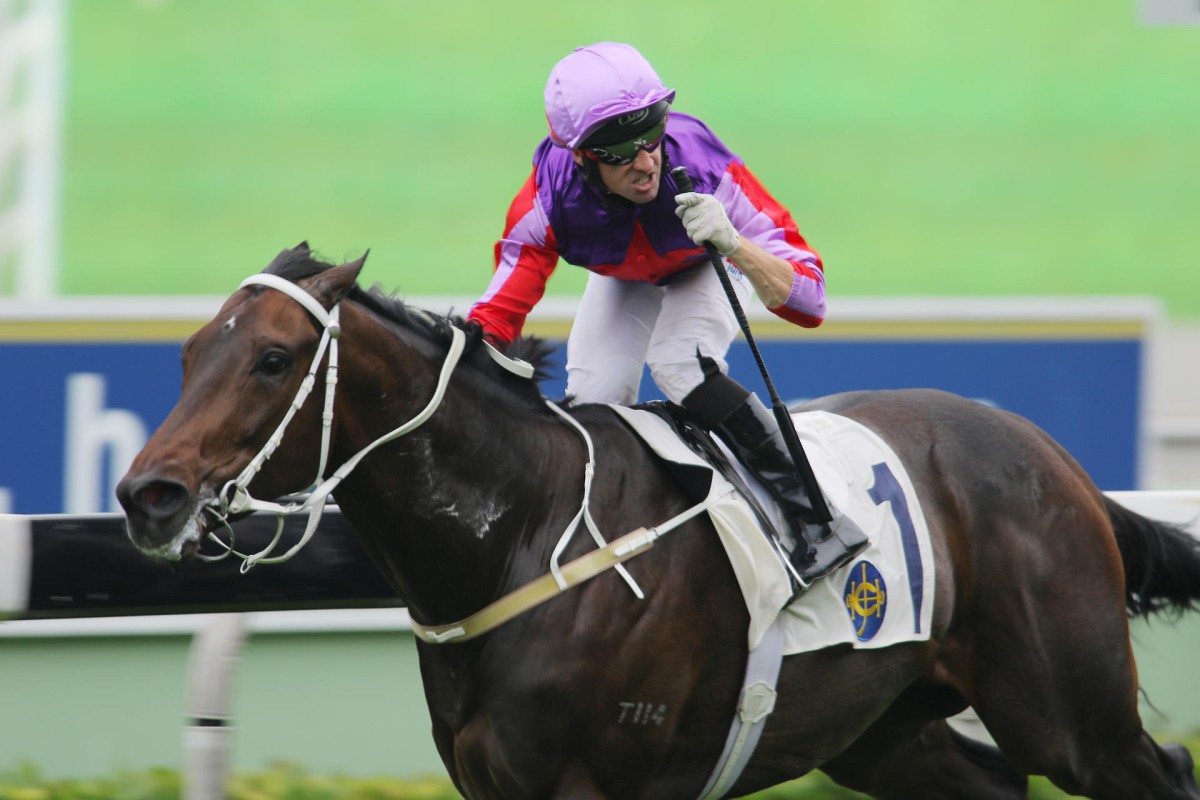 Neil Callan celebrates after making it a double on Tony Cruz's Doyeni. He had won a race before on Romantic Touch. Photo: Kenneth Chan