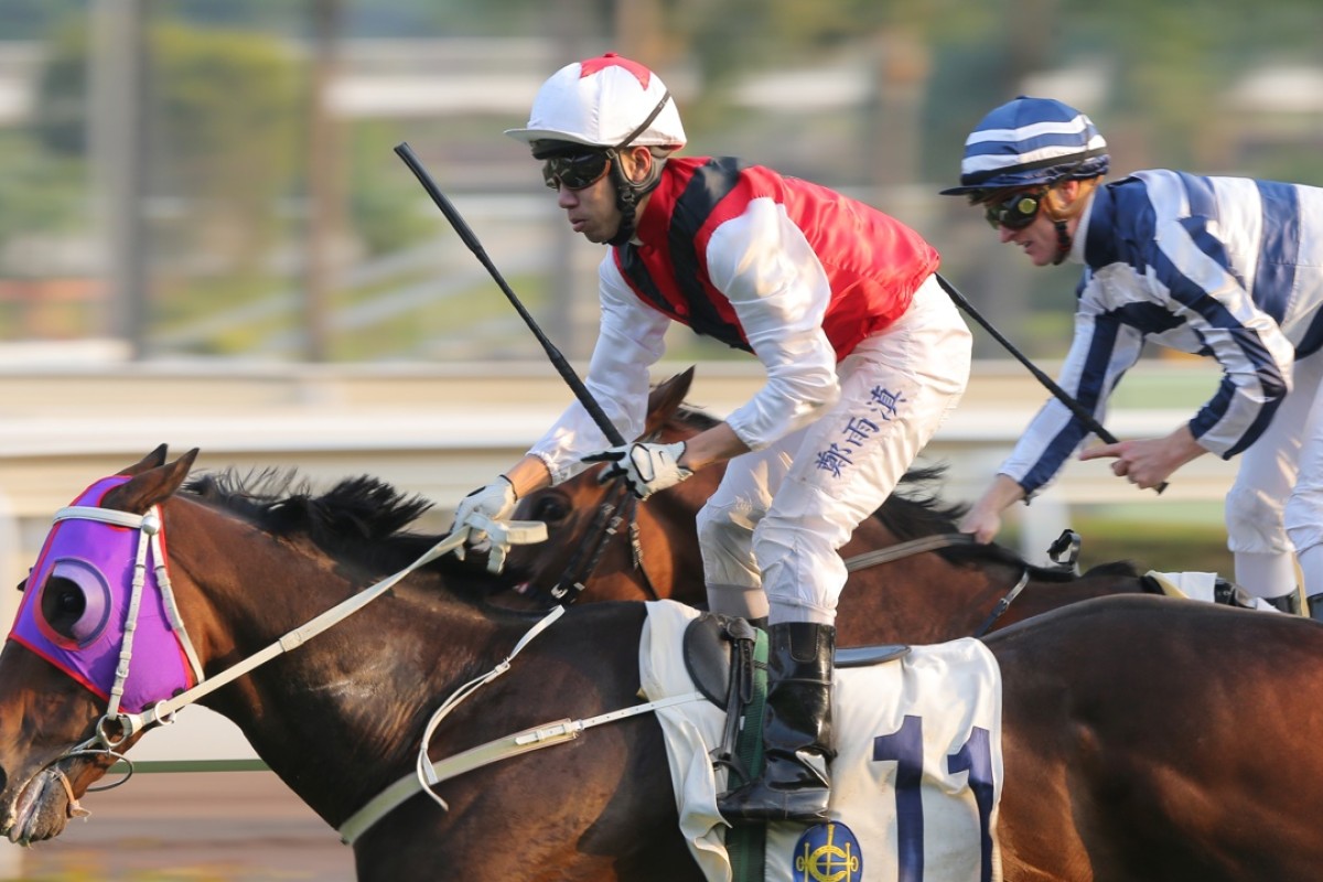 Howard Cheng salutes as Multivictory just gets the better of Packing Pins (Zac Purton) to win the Chinese Club Challenge Cup. Photo: Kenneth Chan
