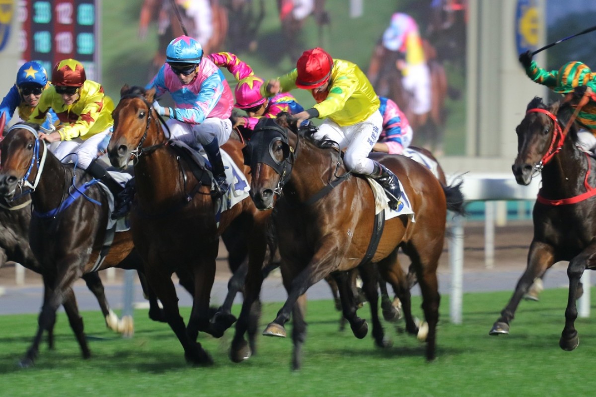 Celestial Smile (Nash Rawiller) races up to Apollo’s Choice (Douglas Whyte) to win the last race and give Paul O’Sullivan a running double. Photo: Kenneth Chan