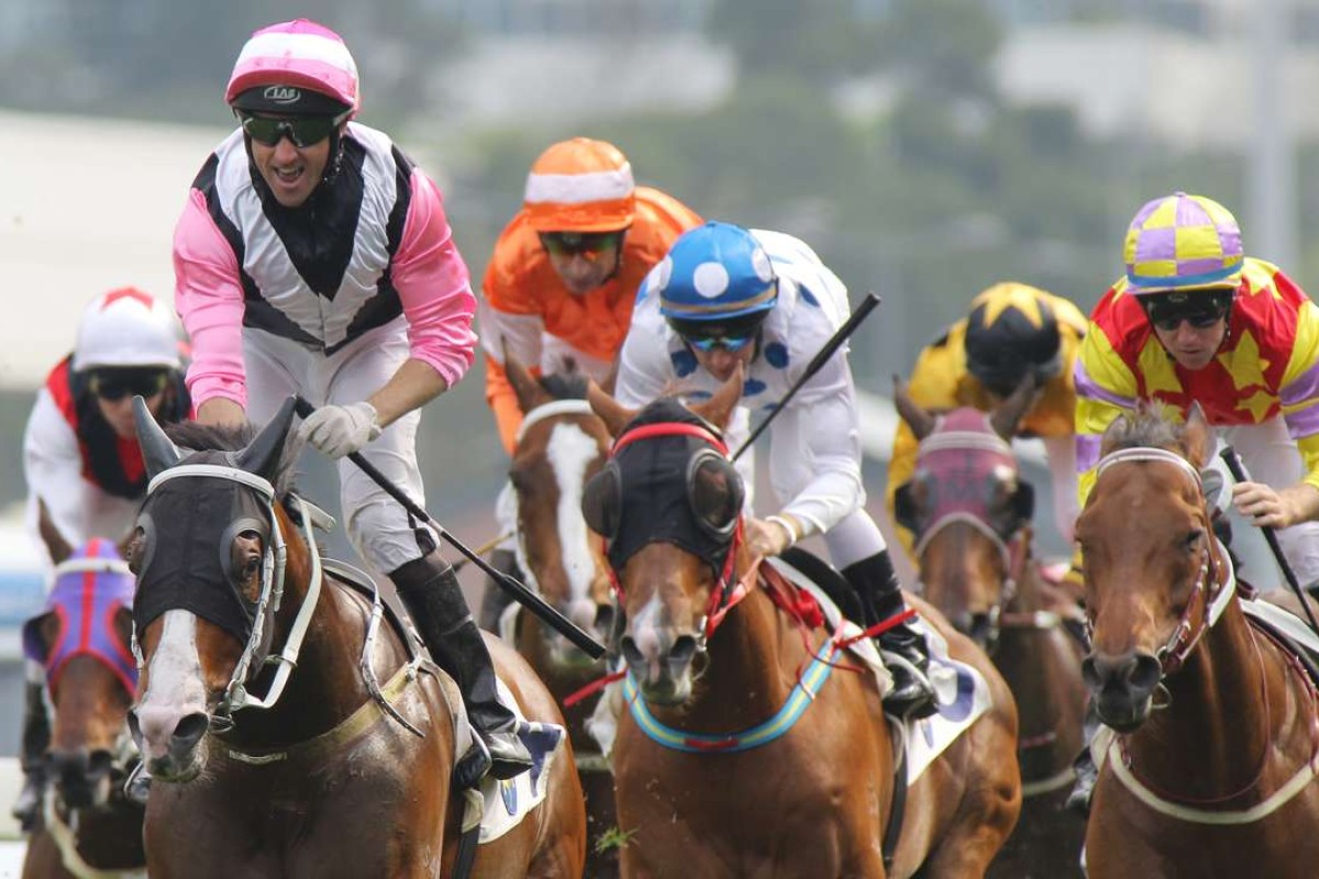 A jubilant Neil Callan celebrates after winning the Chairman’s Trophy on Beauty Only. Photo: Kenneth Chan