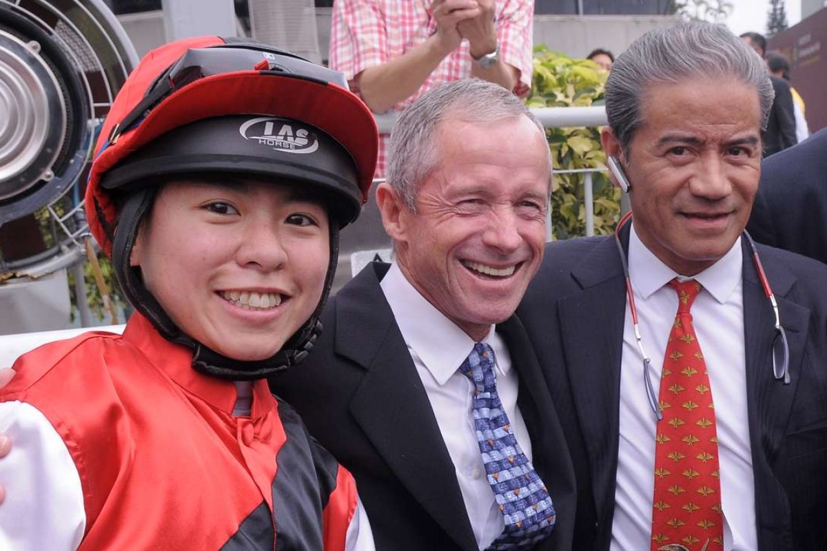 Kei Chiong celebrates her 20th win in Hong Kong with legends Felix Coetzee and Tony Cruz. Her milestone came on Cruz-trained Multiexpress. Photo: Kenneth Chan