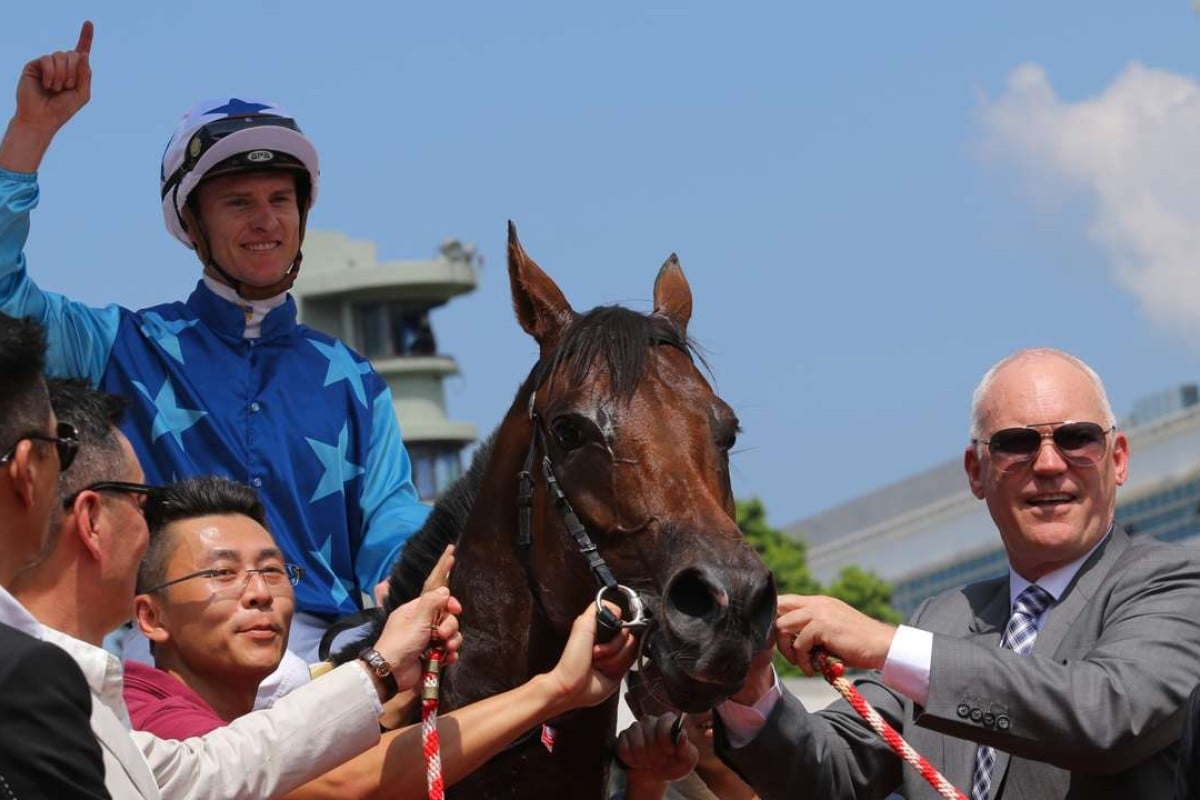 Jockey Zac Purton and trainer David Hall with the promising Jing Jing Win. Photos: Kenneth Chan