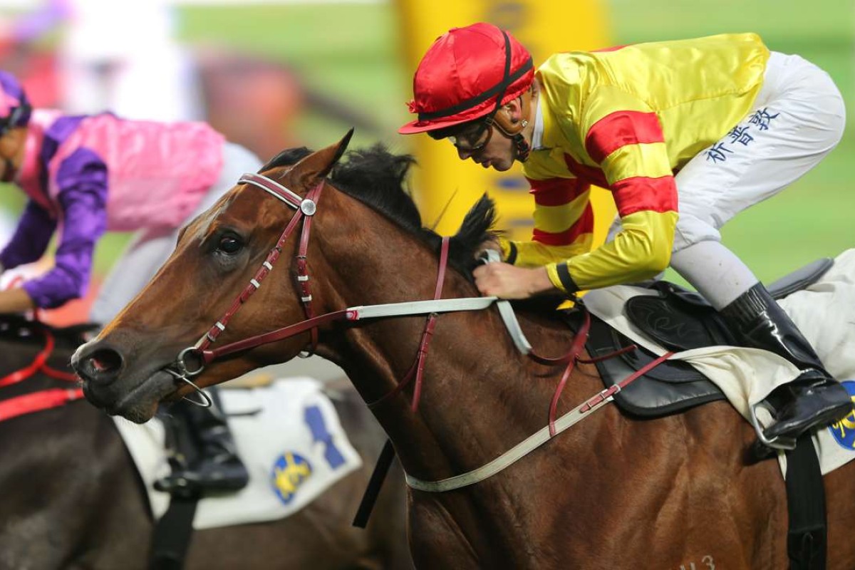 Sam Clipperton guides Booming Delight to victory at Sha Tin on Saturday. Photos: Kenneth Chan