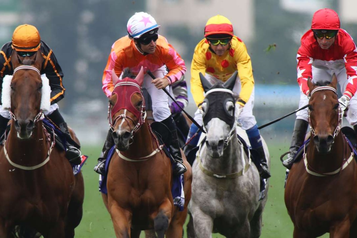 Tommy Berry (second from left) looks to connections after winning the Group One Queen’s Silver Jubilee Cup on Helene Paragon. Photos: Kenneth Chan