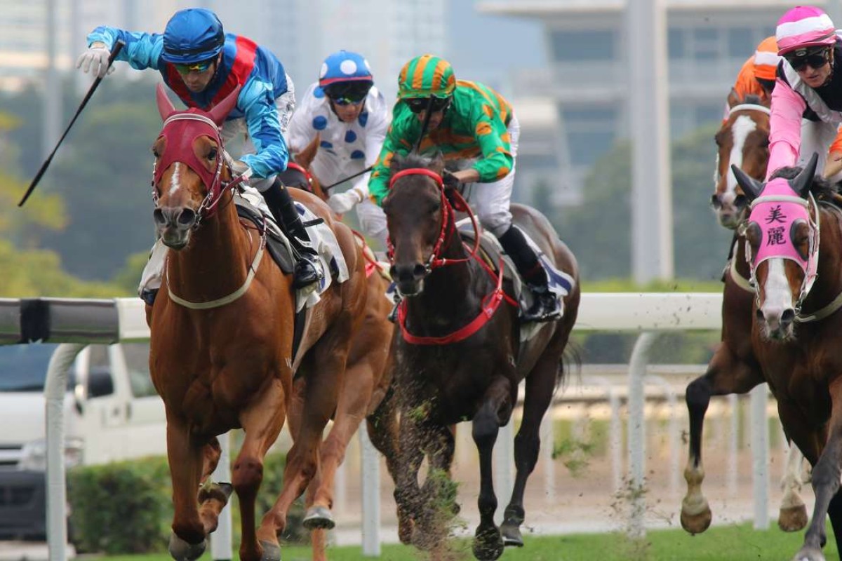 Rapper Dragon holds off a challenge from Beauty Only to win the Group Two Chairman’s Trophy at Sha Tin on Sunday. Photos: Kenneth Chan