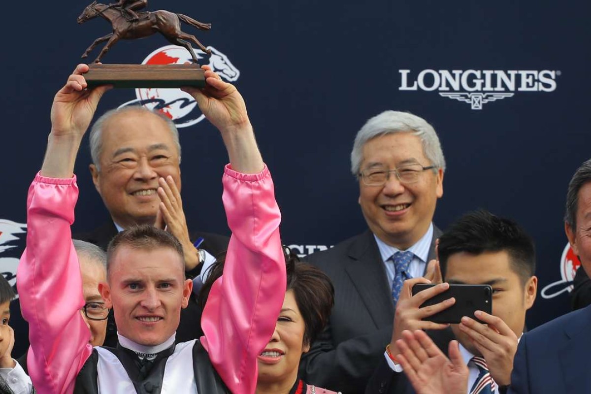 Zac Purton celebrates winning the Hong Kong Mile with Beauty Only. Photo: Kenneth Chan