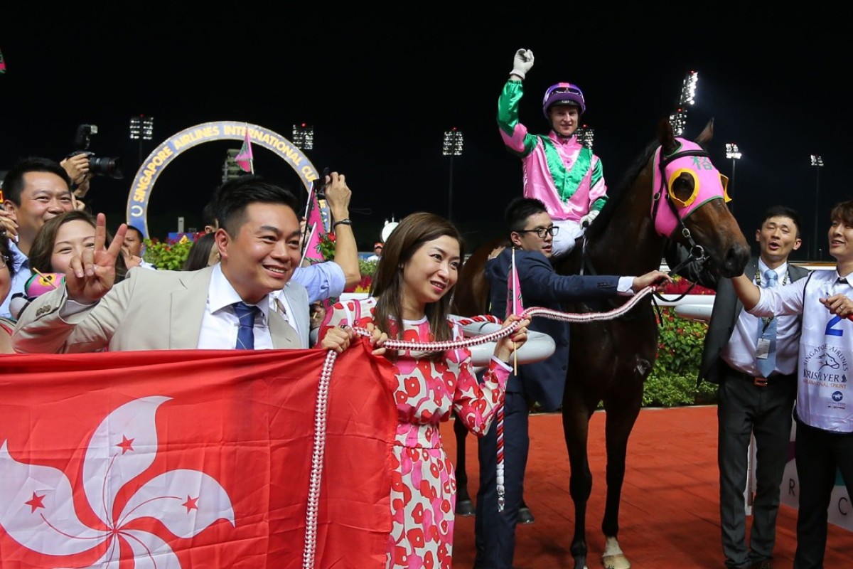 Aerovelocity Zac Purton and owner Daniel Yeung Ngai at Kranji in Singapore after the horse won the Krisflyer. Photo: Kenneth Chan.