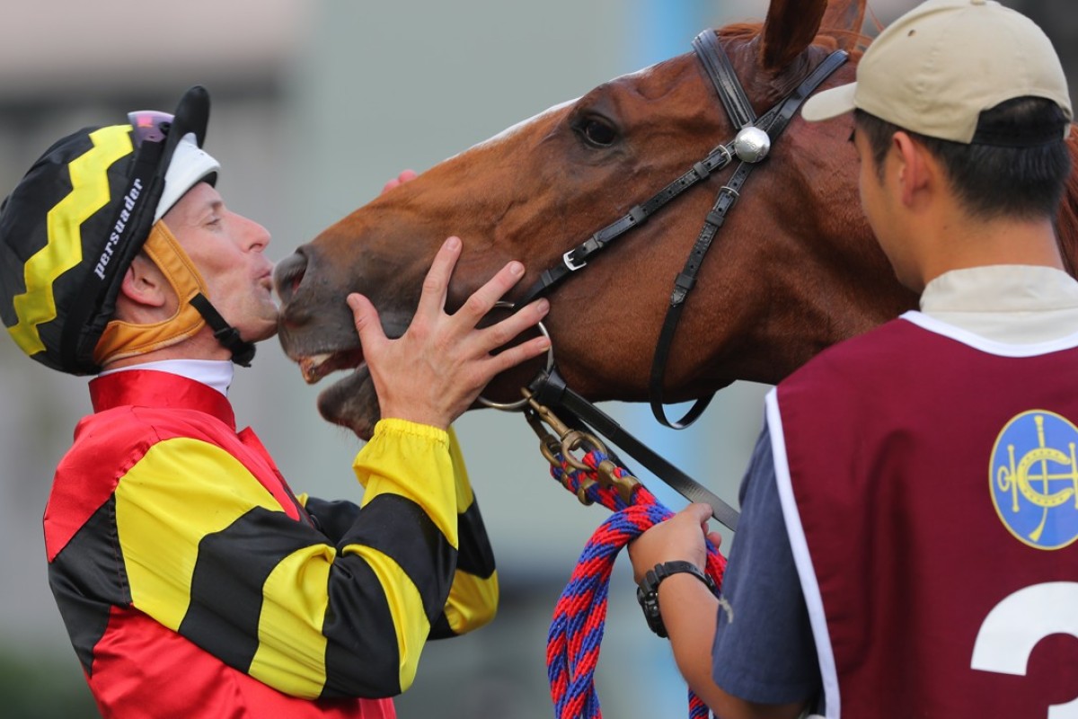 Hugh Bowman plants a big kiss on Lucky Bubbles after taking out the Group One Chairman’s Sprint Prize at Sha Tin on Sunday. Photos: Kenneth Chan