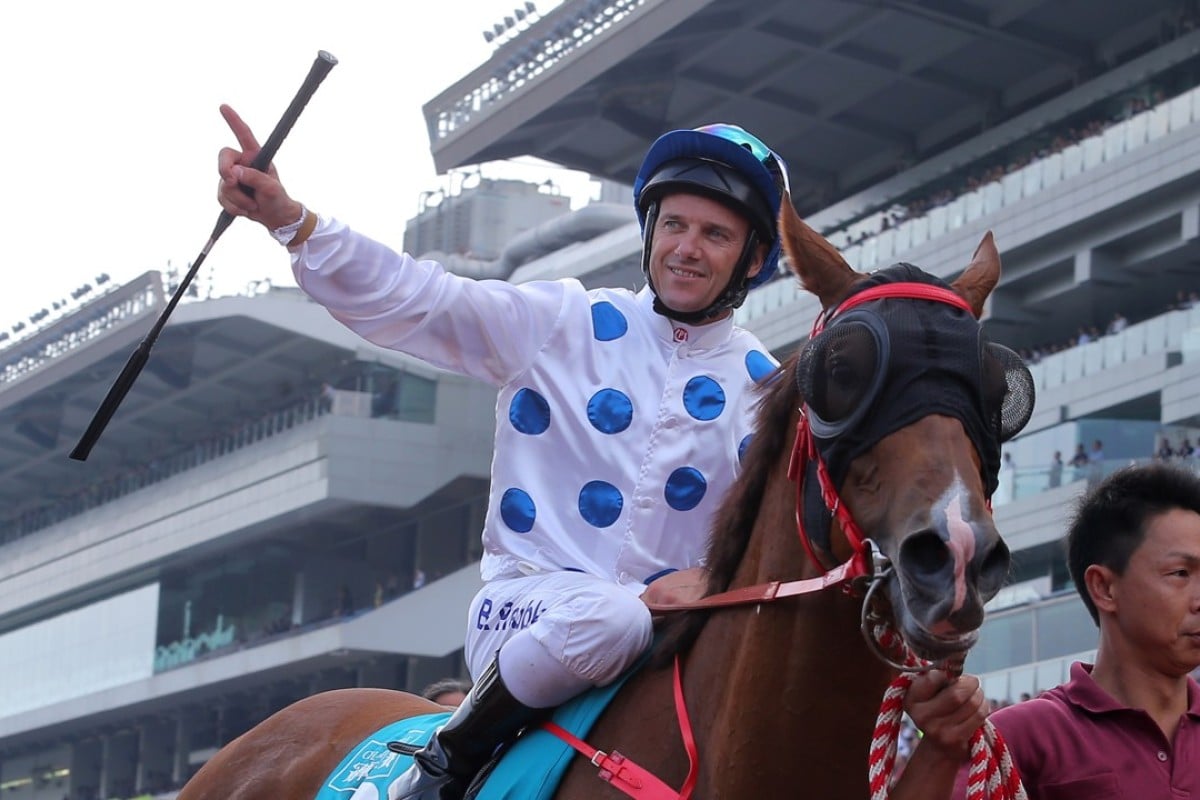 Brett Prebble salutes to the crowd after winning the Group One Champions Mile with Contentment on May 7. Photos: Kenneth Chan