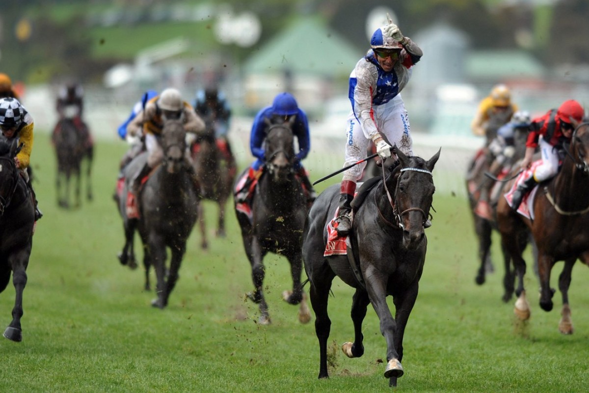 Gerald Mosse wins the 2010 Melbourne Cup on American horse Americain. The Frenchman was allowed to miss his riding engagements back in Hong Kong on the Wednesday. Photo: EPA