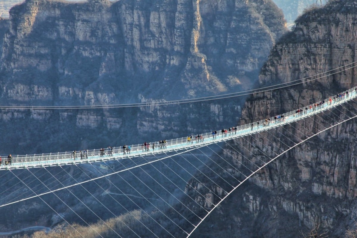 The glass suspension bridge at Hongyagu Scenic Area in Pingshan county, Hebei province. Image: Xinhua