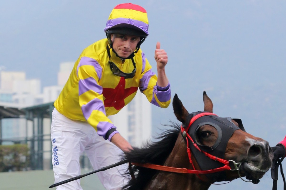 Ryan Moore gives the thumbs up after winning the BMW Hong Kong Derby. Photo: Kenneth Chan