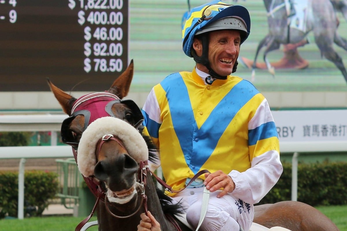 Damien Oliver is all smiles after winning with Grand Chancellor at Sha Tin on Sunday. Photos: Kenneth Chan