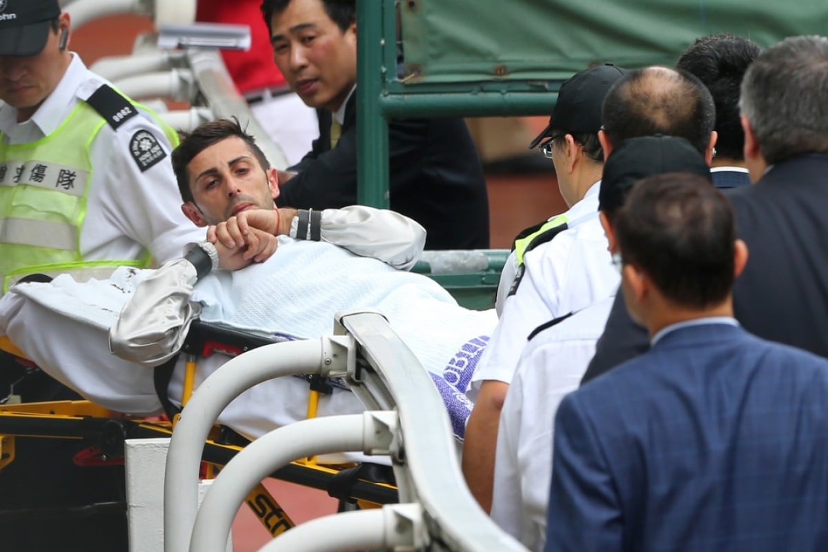 Alberto Sanna goes to hospital after dislocating his shoulder during a race. Photos: Kenneth Chan