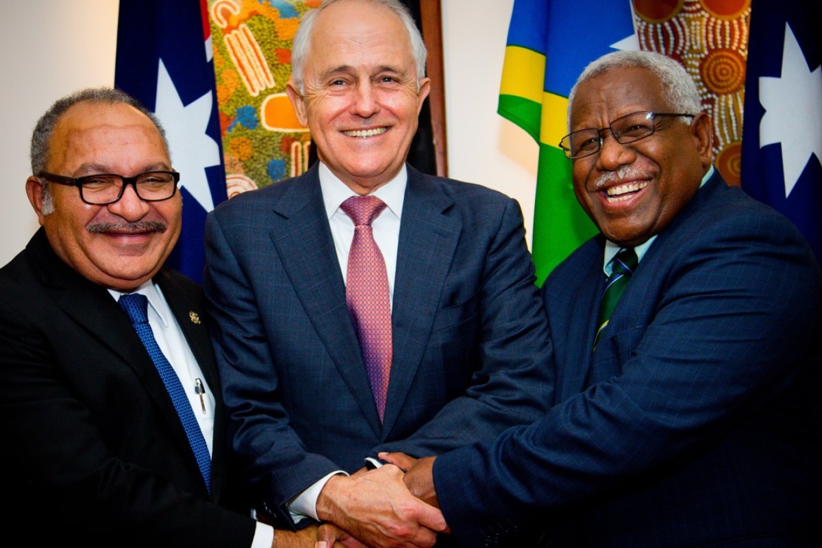Papua New Guinea’s Prime Minister Peter O'Neill, Australian Prime Minister Malcolm Turnbull and Prime Minister of the Solomon Islands Rick Houenipwela. Photo: AFP