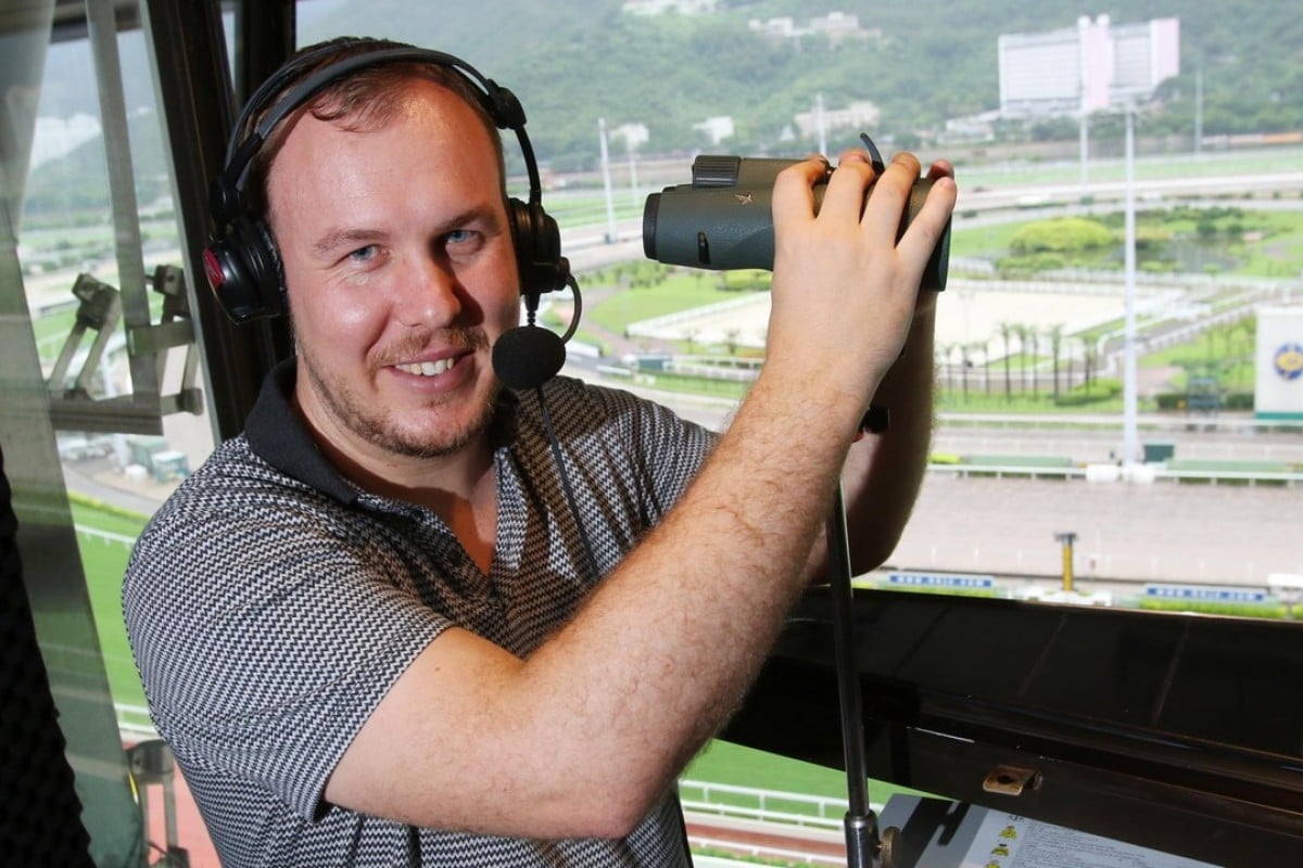 New Hong Kong racecaller Tom Wood in the commentary box at Sha Tin. Photo: Kenneth Chan