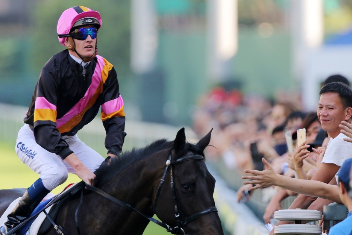 Chad Schofield receives a round of applause after riding a winner at Happy Valley on Sunday. Photos: Kenneth Chan