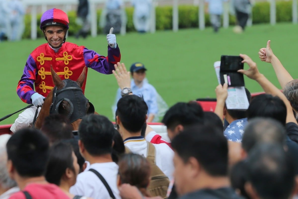 Joao Moreira celebrates a winner with the fans at Sha Tin. Photos: Kenneth Chan