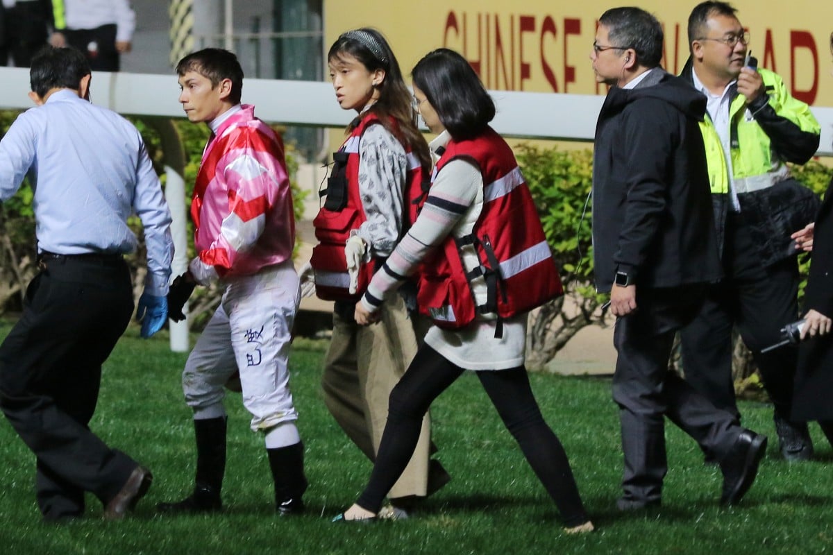 Alexis Badel walks back to scale after falling from Simply Brilliant. Photos: Kenneth Chan